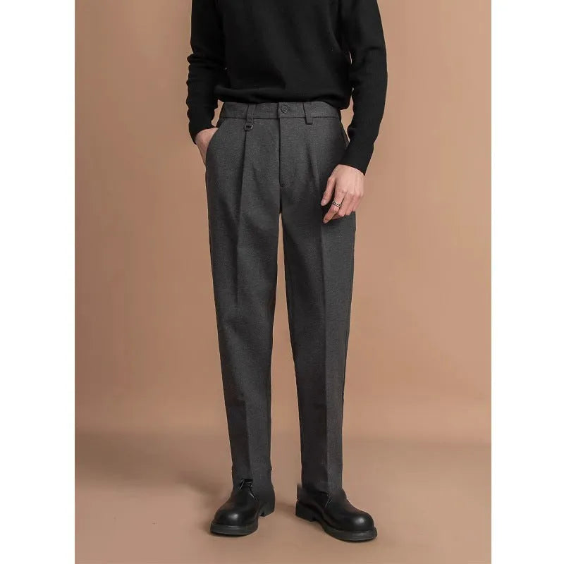 Men's straight-leg trousers in polyester with draped detail, shown in black, dark grey, khaki or brown.