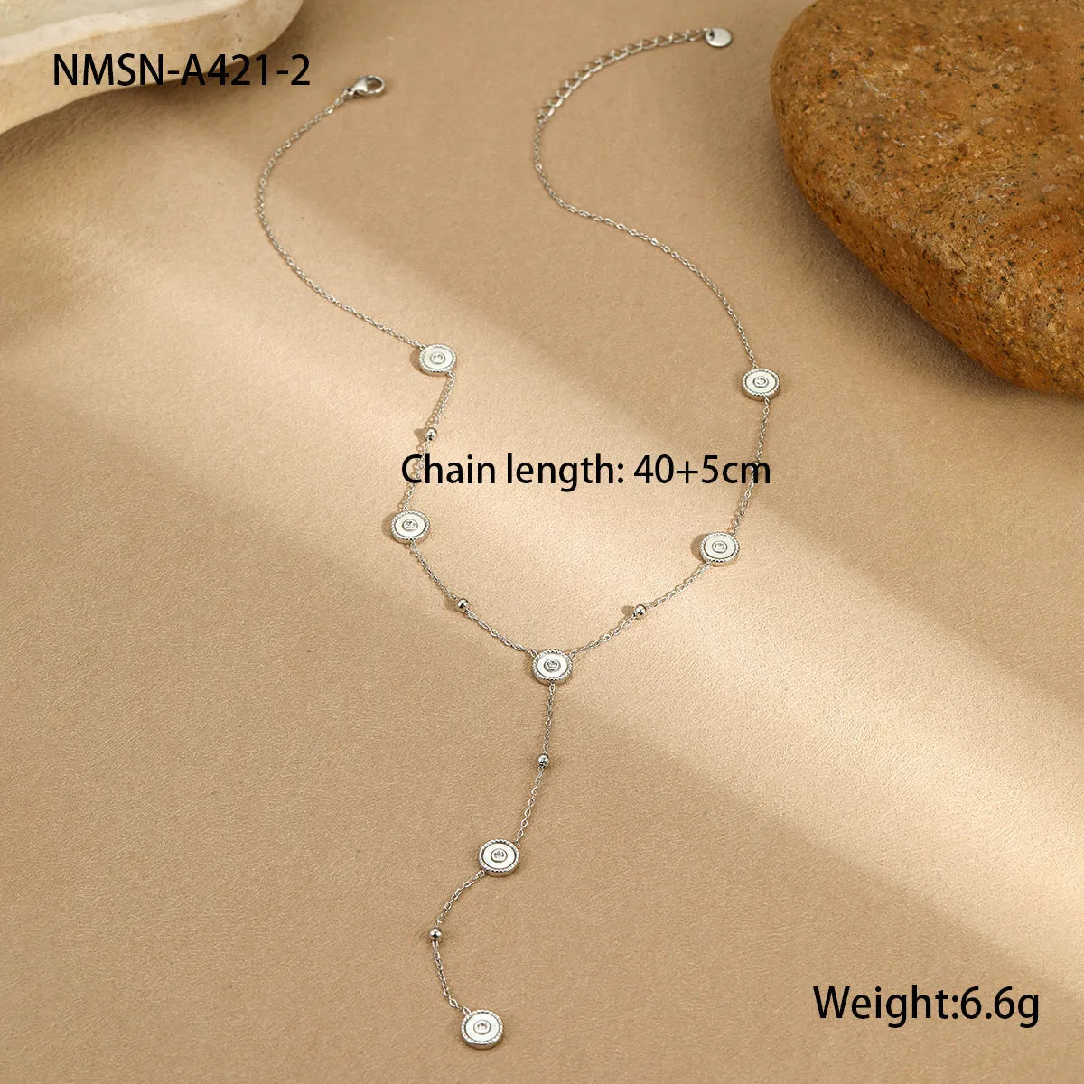 Gold-plated geometric fritillary design stainless steel bracelet and necklace set for women.
