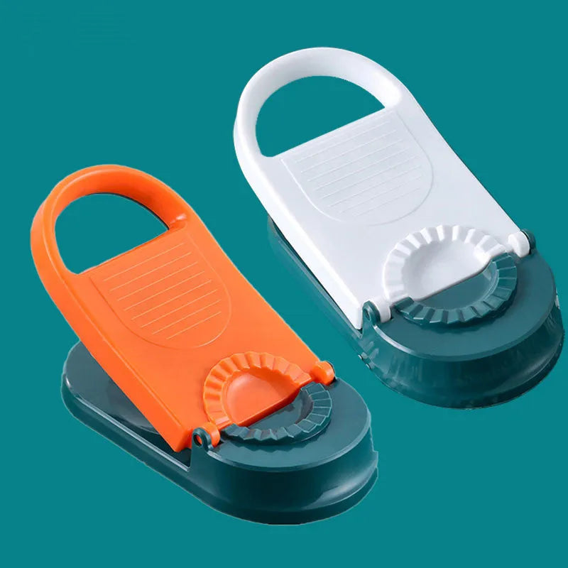 Orange and white manual dumpling skin press tool with ergonomic handle and hanging hole
