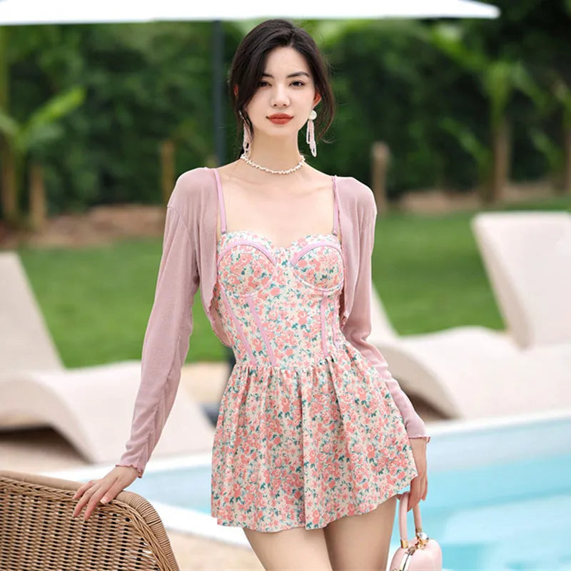 Women's pink and green floral one-piece swimsuit jumpsuit with suspender straps