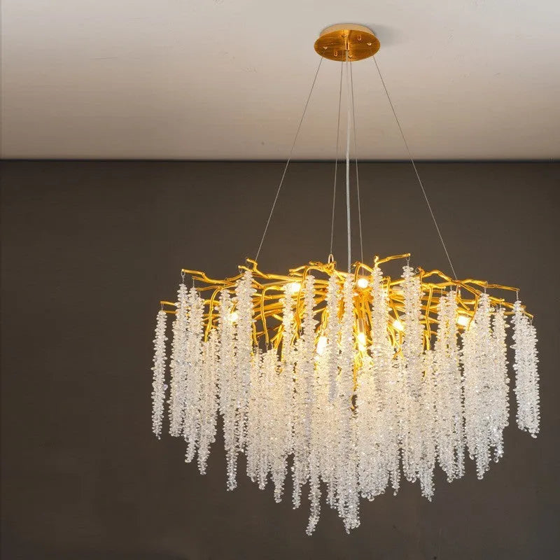 Modern crystal and aluminium alloy LED chandelier light fixture with adjustable height.