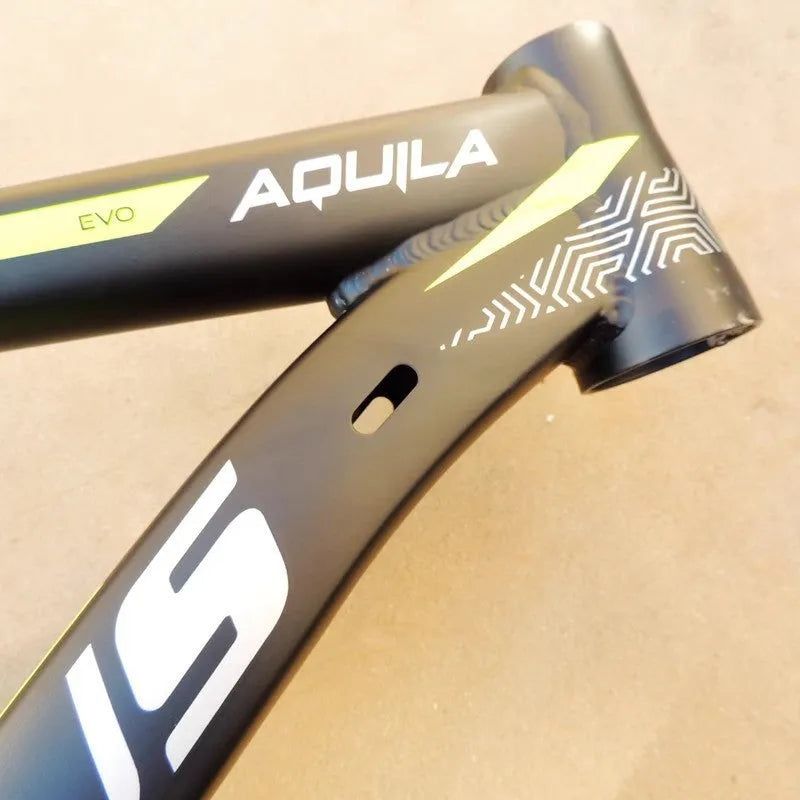 Black green 29-inch aluminium mountain bike frame with disc brake mounts and internal cable routing ports.