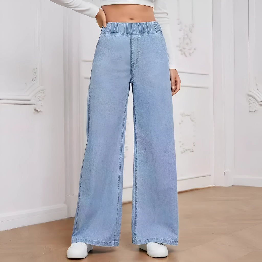 Light blue washed plus size women's wide-leg straight jeans on a mid-waist fit.