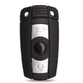 BMW semi-intelligent remote car key fob with three buttons, metal and plastic casing.
