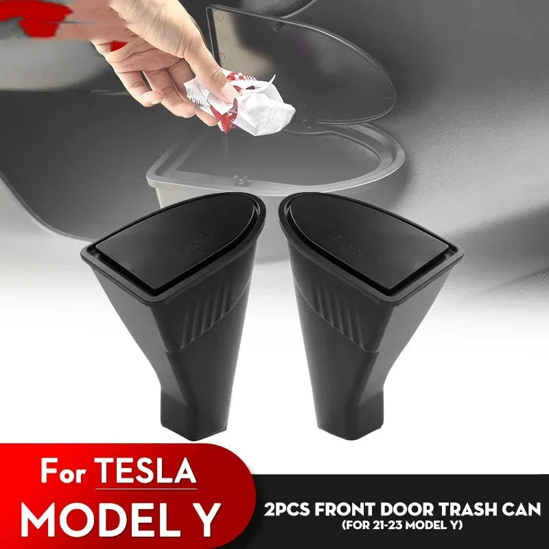 Two black ABS plastic storage and trash can bins designed for the front door panels of a Tesla Model Y.