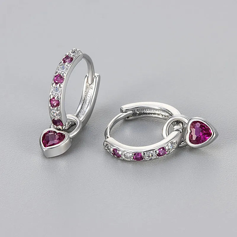 Women's heart-shaped drop earrings with a coloured gemstone, in gold or white gold plating.
