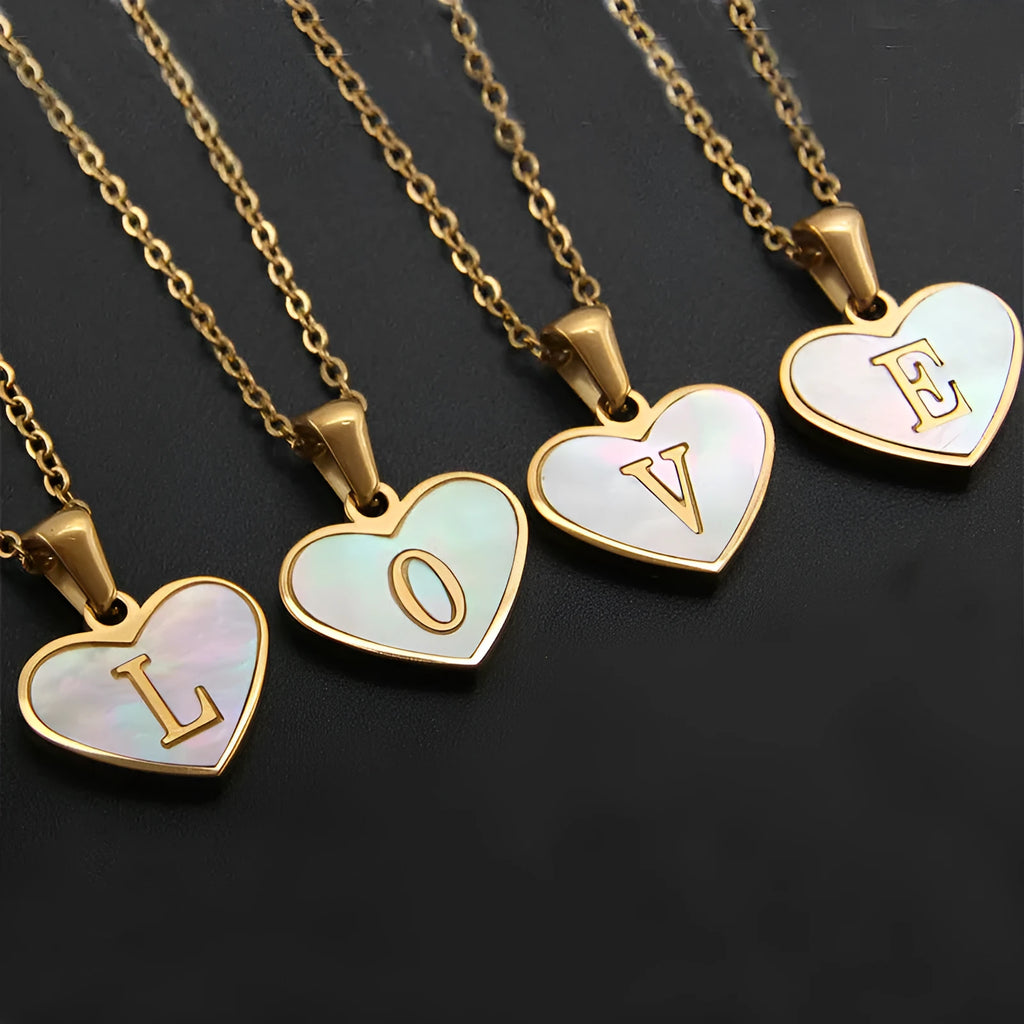 Gold-plated heart necklace with white shell centre and personalised letter pendant on 45cm chain