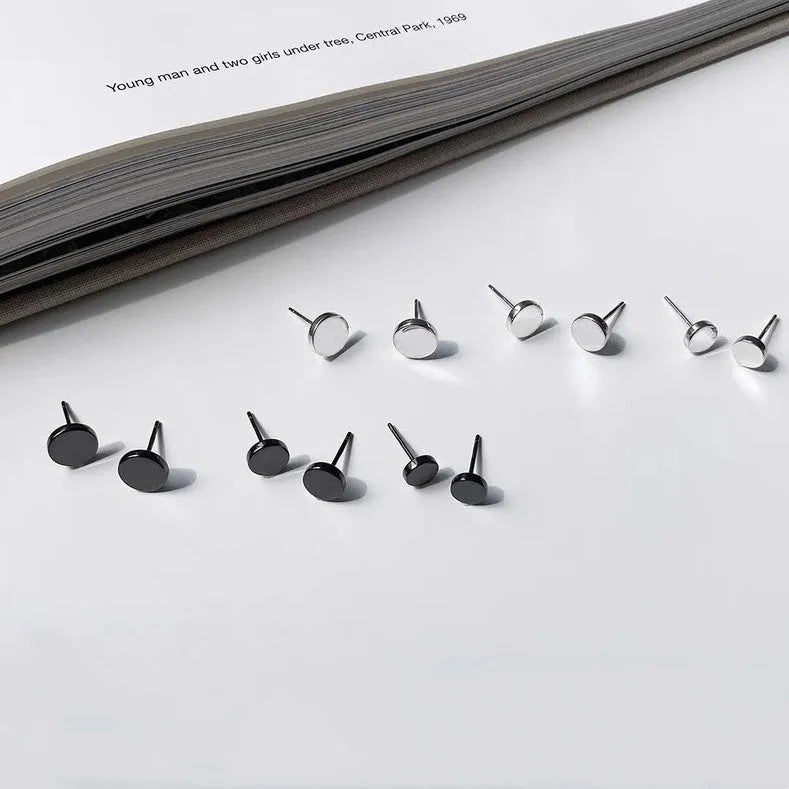 S999 sterling silver flat ear bone studs in geometric round design