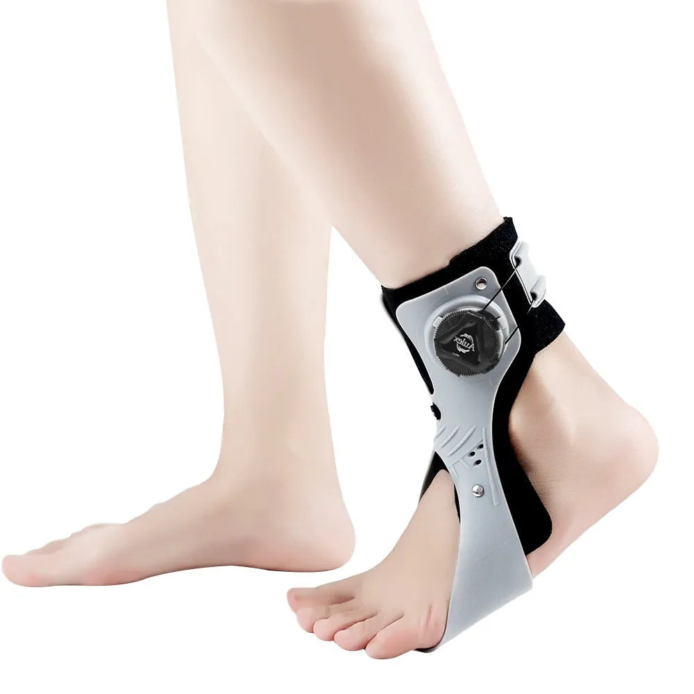 Grey ankle brace with airbag button support mechanism for ankle fixation and protection