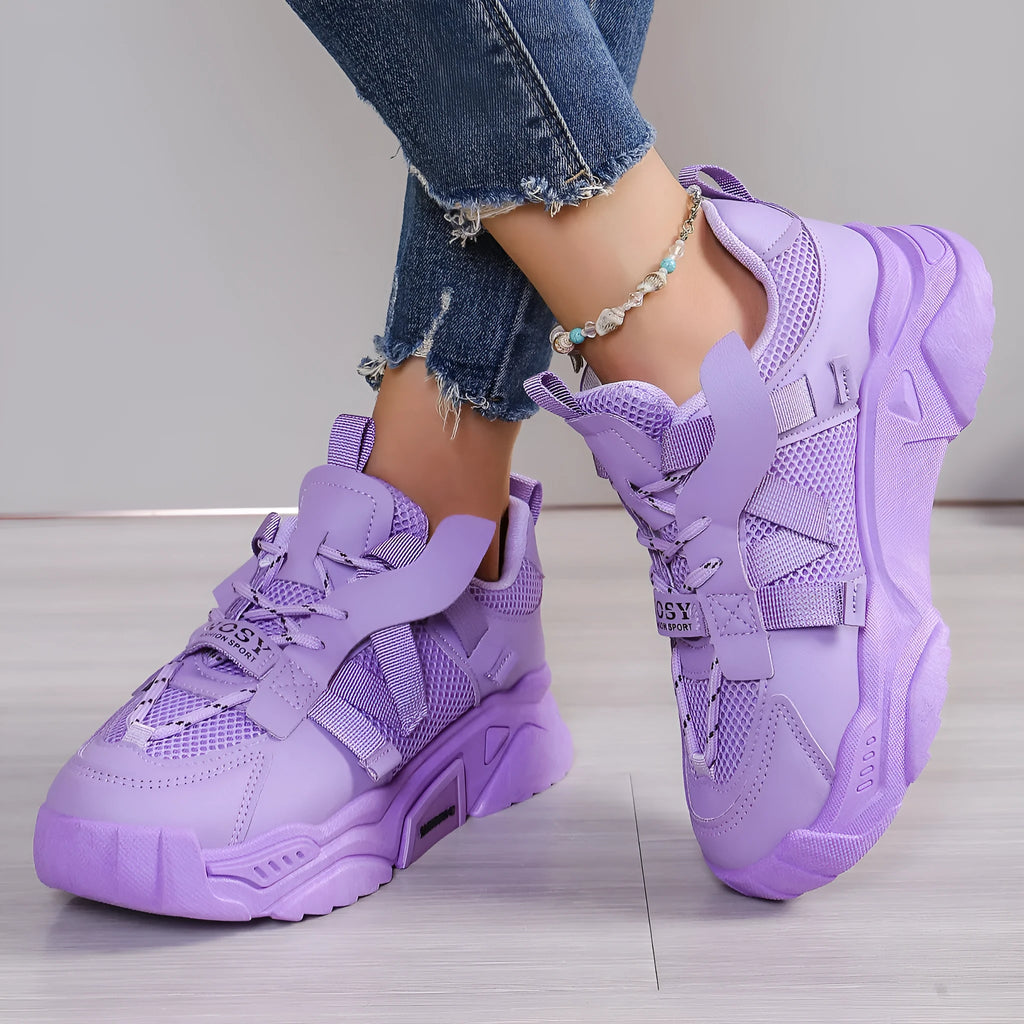 Women's green platform mesh sports shoe with lace-up front and thick sole