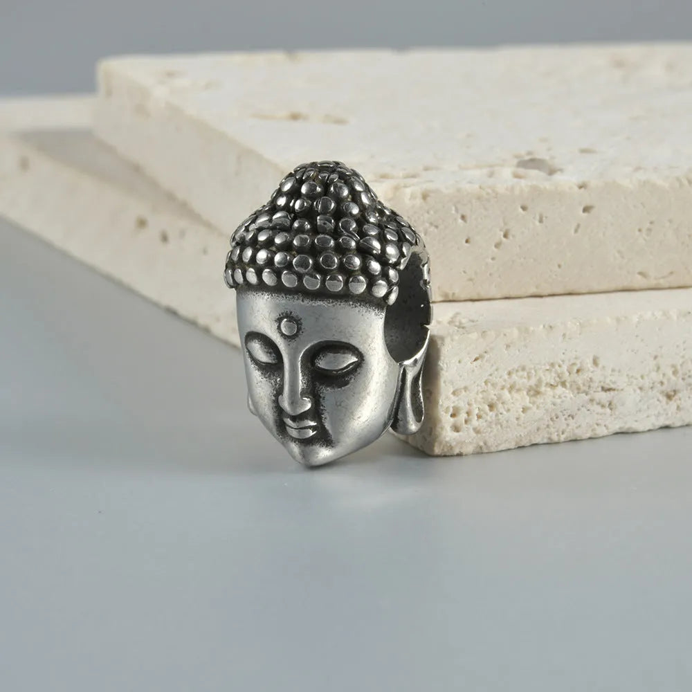 Personalised stainless steel hollow skull Buddha geometric earring in gold electroplate.