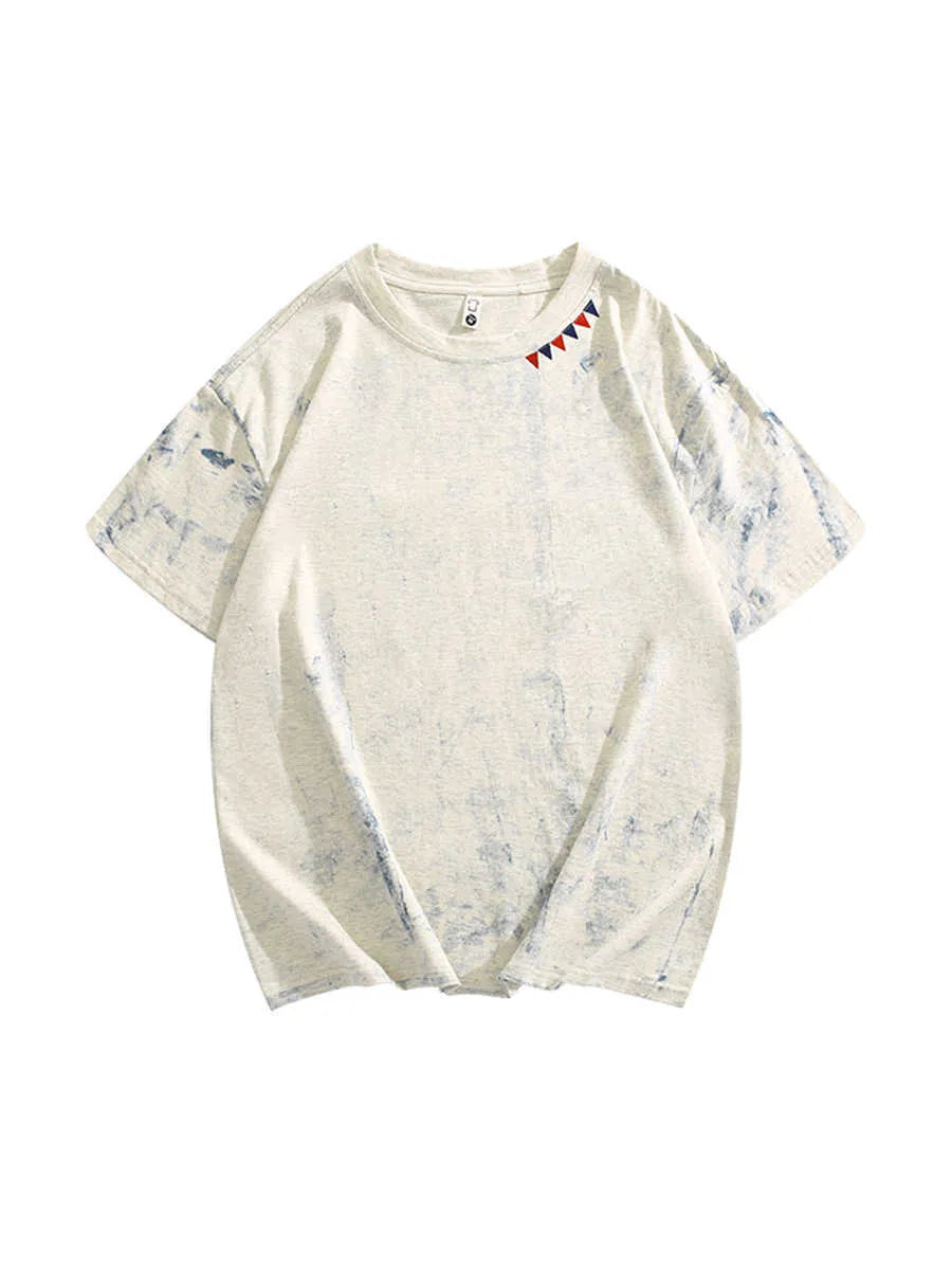 Grey loose fit t-shirt with an all-over tie dye print and short sleeves.