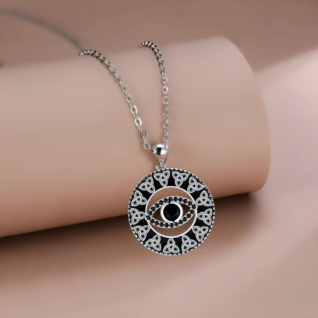 Copper Devil's Eye pendant necklace with electroplated finish on a cross chain for women.