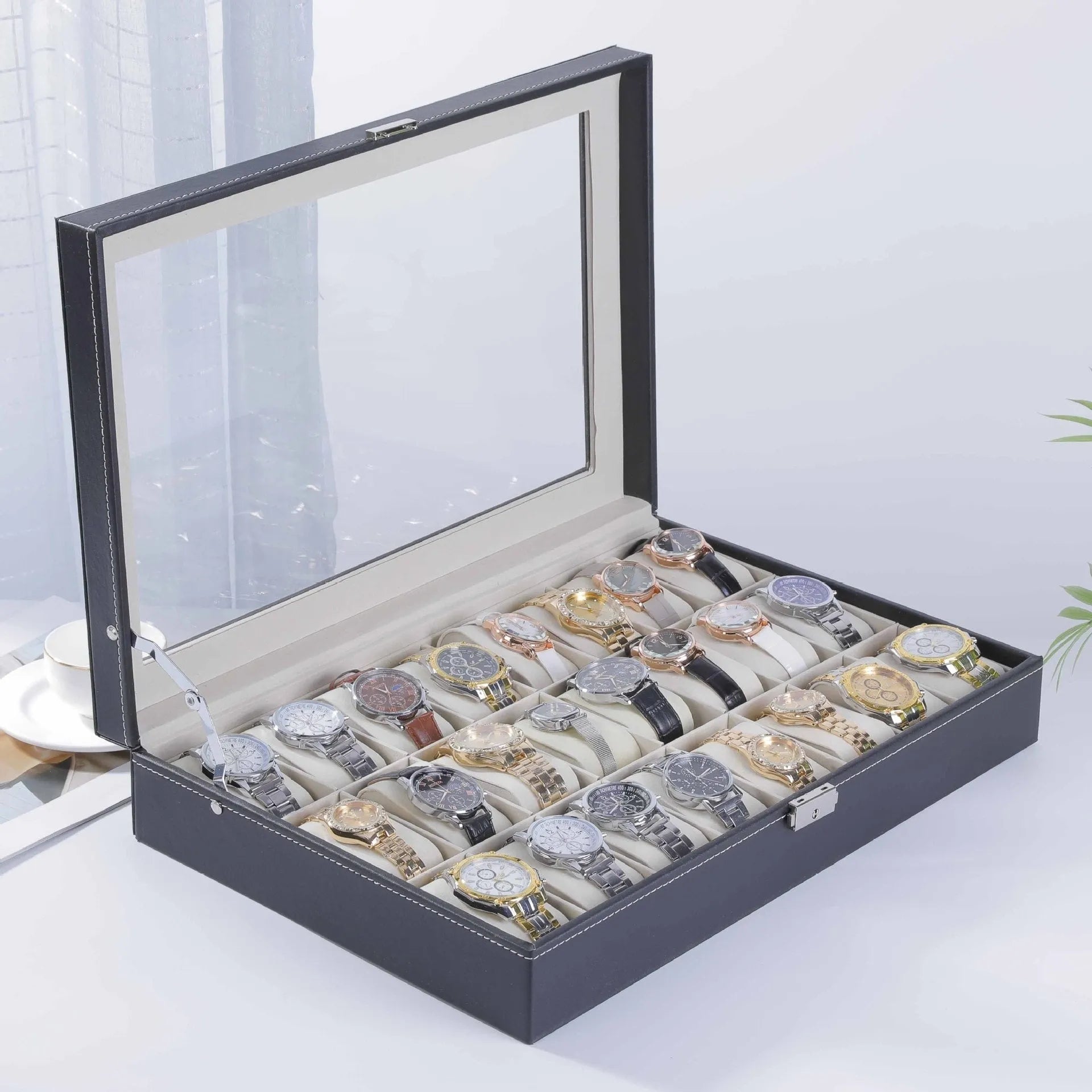 Grey high-grade leather watch storage box with a clear see-through lid, shown holding multiple watches.