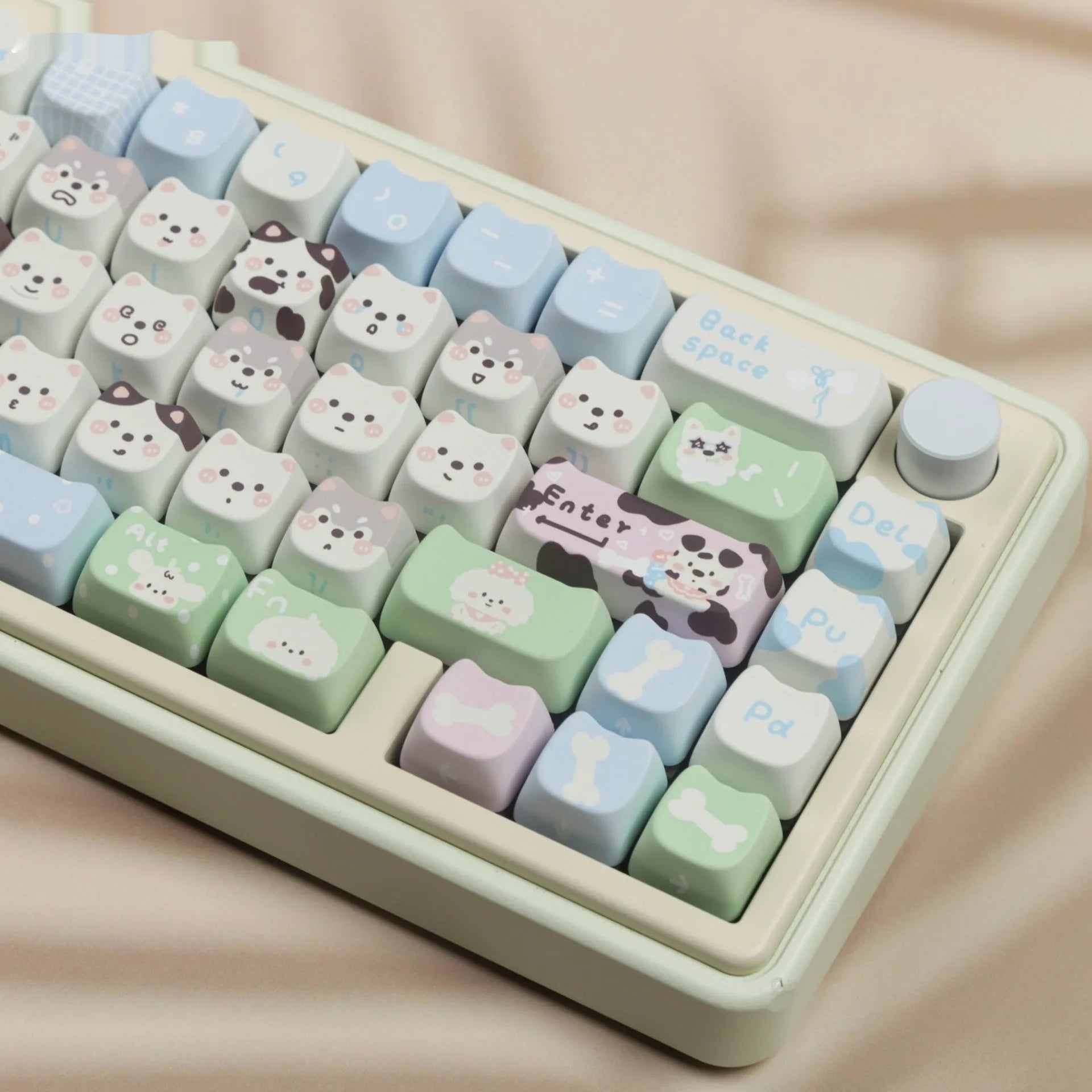 Full set of colourful anime puppy design PBT keycaps for a mechanical keyboard on a white background.