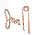 Polyester dog chest strap harness in Early Snow colour with hand-holding rope, side view on floor