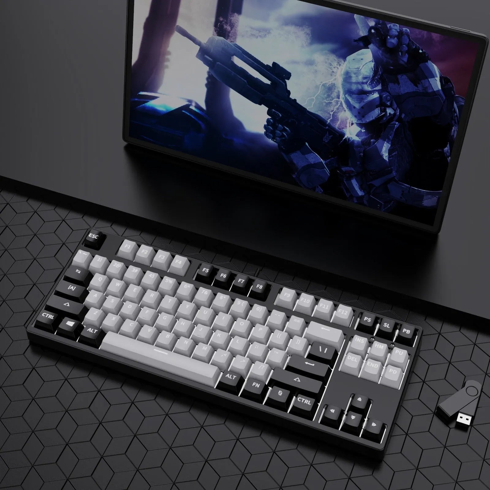 87-key wired mechanical keyboard with two-tone keycaps, shown with switch puller and cleaning brush