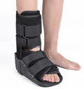 Grey and black Achilles tendon rehabilitation boot with adjustable straps and rocker sole for walking support.