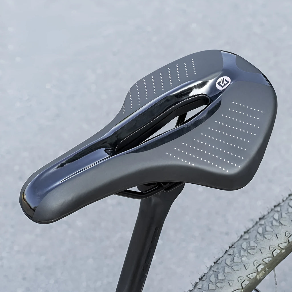 Medium size mountain bike seat cushion in black or pink colour options on bicycle saddle