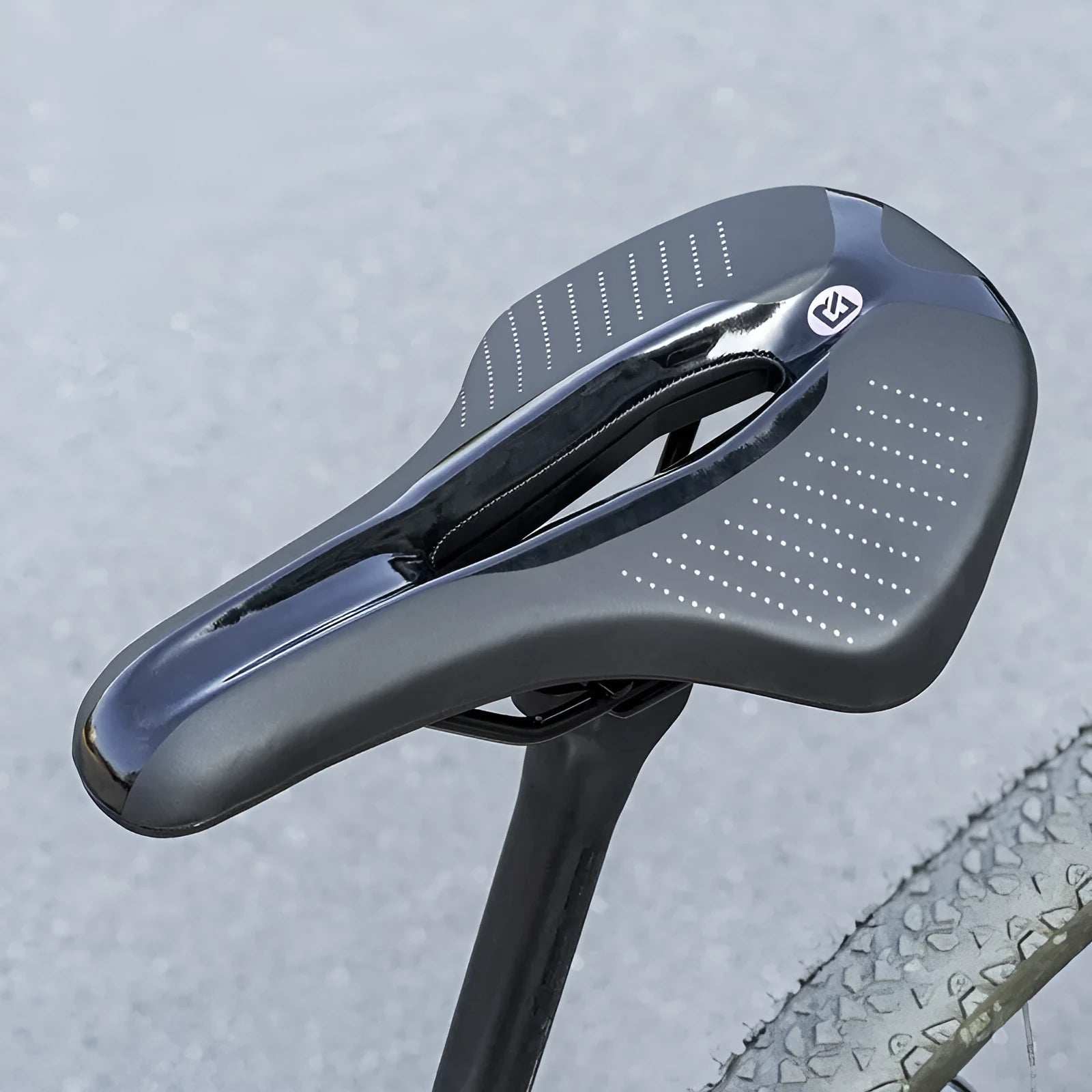 Medium size mountain bike seat cushion in black or pink colour options on bicycle saddle
