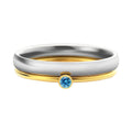 Gold-toned titanium steel engraved ring with December birthstone colour and geometric layered design.