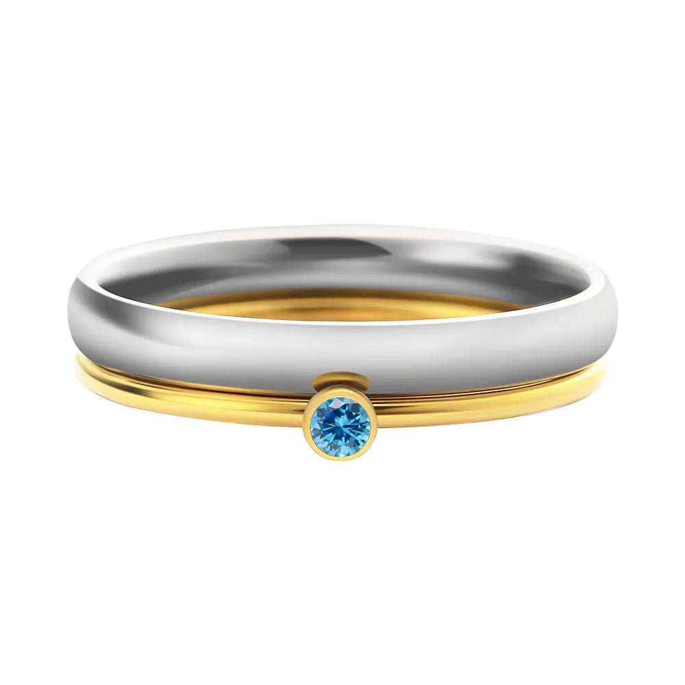 Gold-toned titanium steel engraved ring with December birthstone colour and geometric layered design.