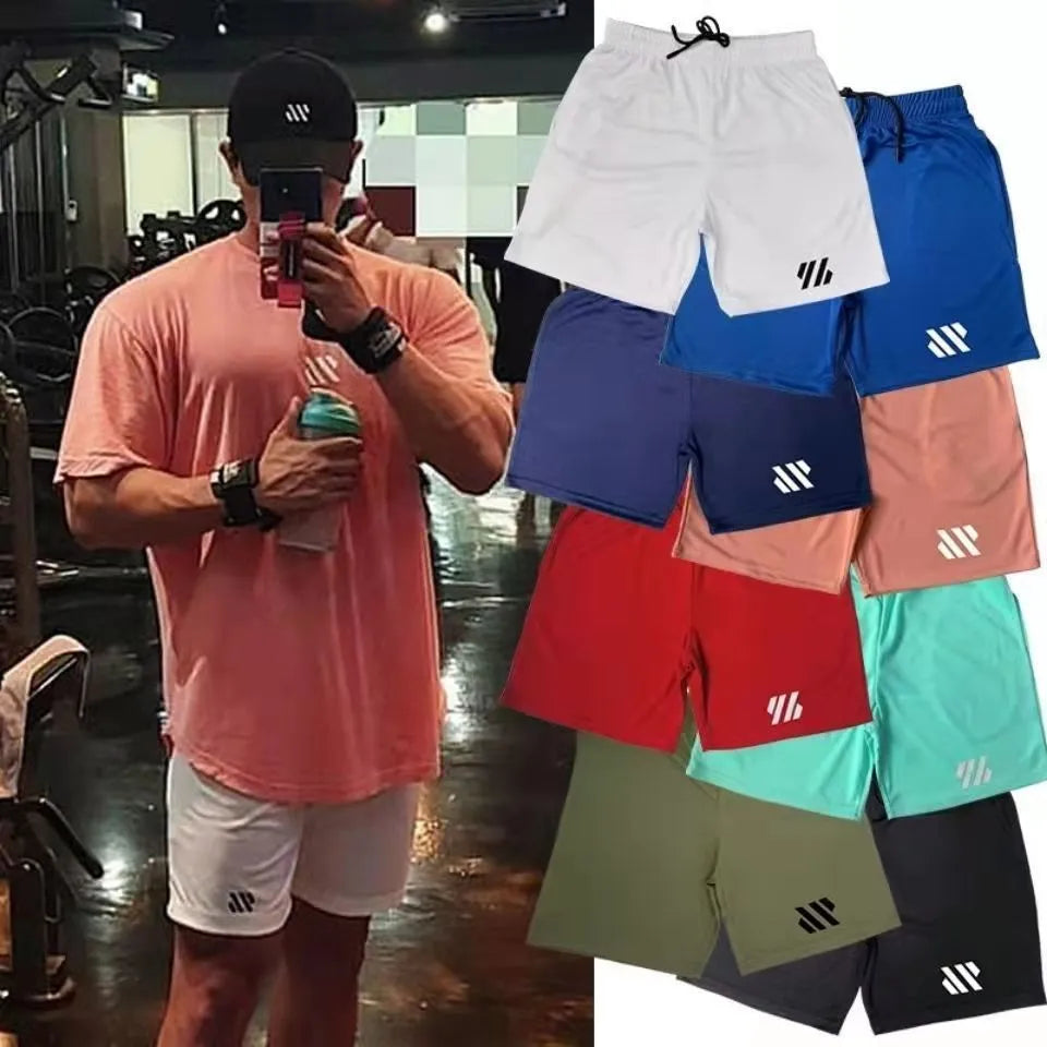 Man's loose-fit metal silk sports shorts in various colours on a hanger.