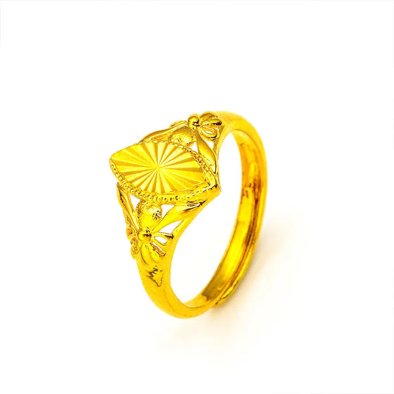Alluvial gold coloured open diamond flower ring with geometric texture on brass metal