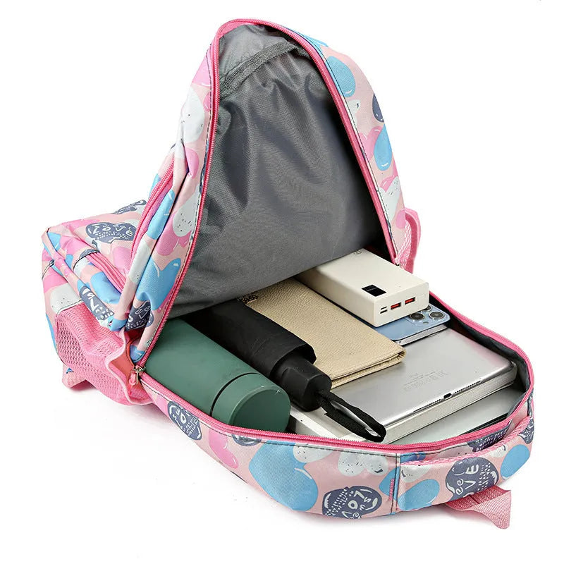 Blue student schoolbag with air pillow belt straps and large main compartment.
