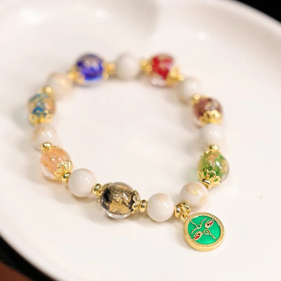 Fragrant Gray handmade glass bracelet with five Gods of Wealth design in coloured glaze.