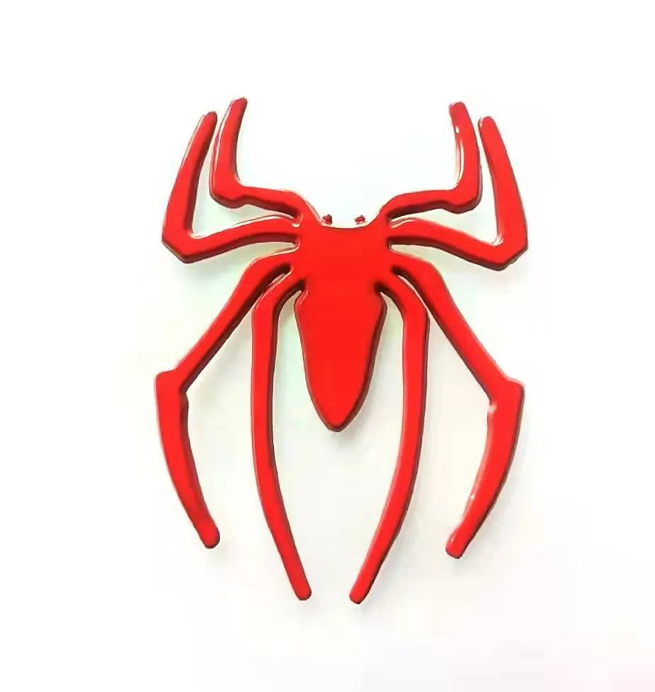 Three-dimensional metal spider car bumper sticker in gold, silver, black, and red colour options.