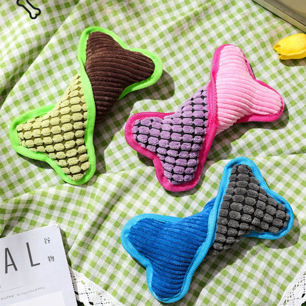 Blue teddy dog chew toy with sound bone, showing soft corn fleece lining and bite-resistant fabric.