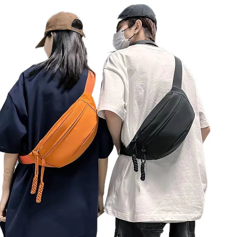 Men's adjustable crossbody bag in black showing compact dimensions and sport design