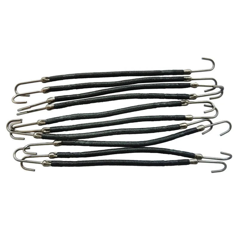 Close-up of a black double hook hair tool for fastening wigs and hair weaves.