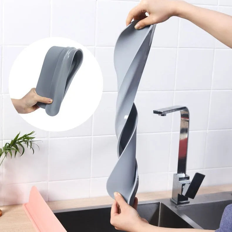Silicone kitchen sink water blocking plate in black, blue, and grey colours showing 52x5x85mm dimensions