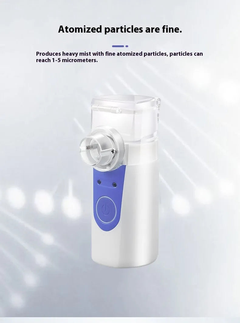 White columnar handheld USB nebuliser spray machine on a table with data cable.