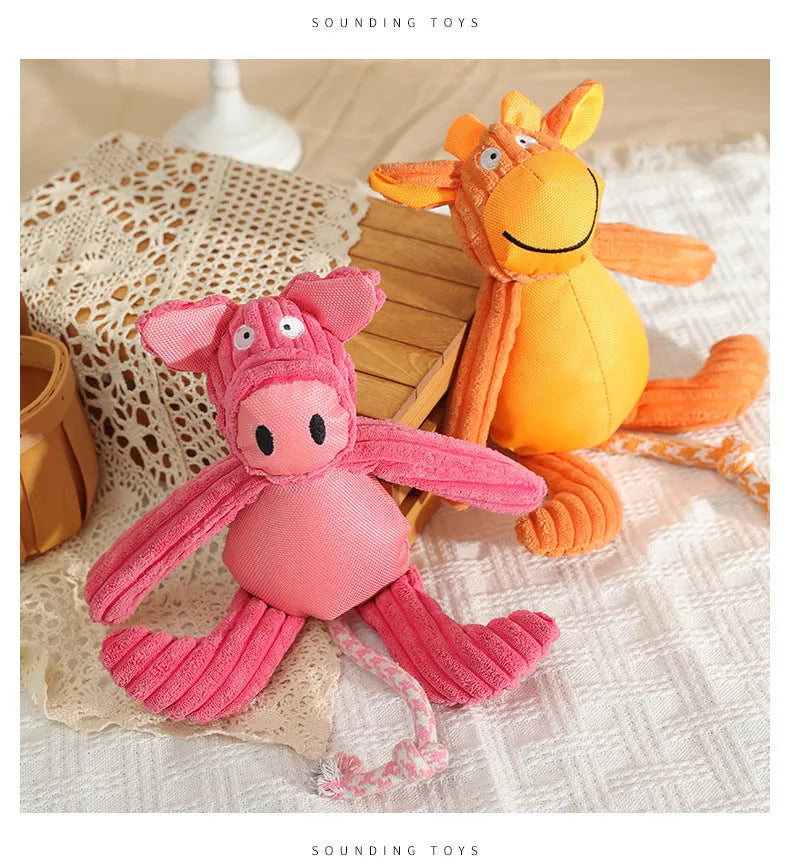 Plush dog toy in cow and pig design with squeaker, 40 x 32cm, orange or pink