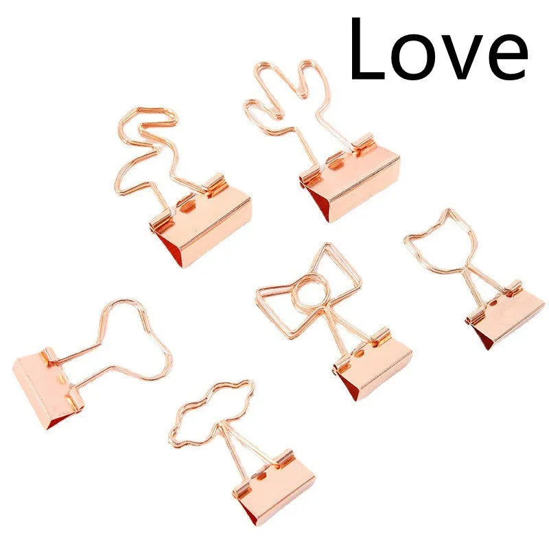 Gold long tail metal clip with a decorative flamingo, love, clouds, cat, cactus, or bow design top.