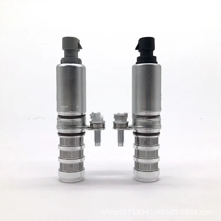 A pair of metallic VVT oil control solenoid valves for Buick and Chevrolet vehicles.