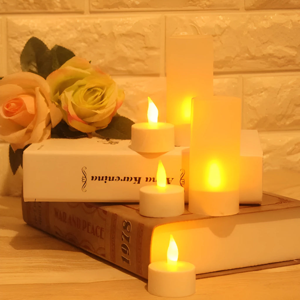 White plastic USB rechargeable LED candle lamp showing yellow glowing flame.