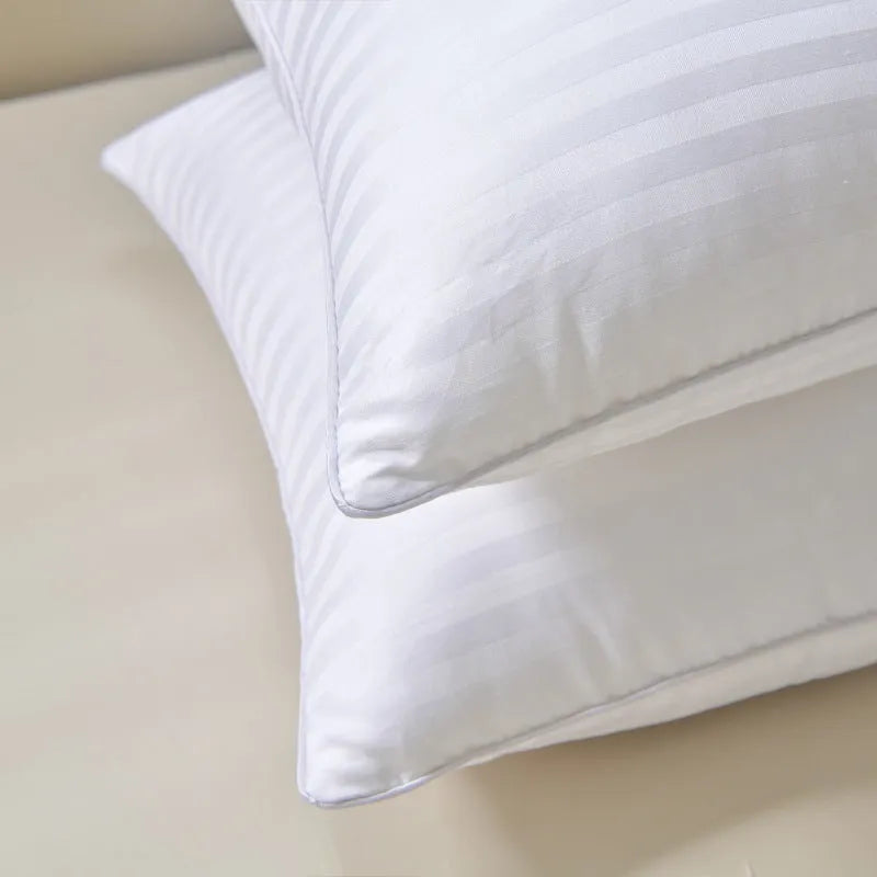 White cotton satin stripe pillow with feather cotton core showing size and loft options