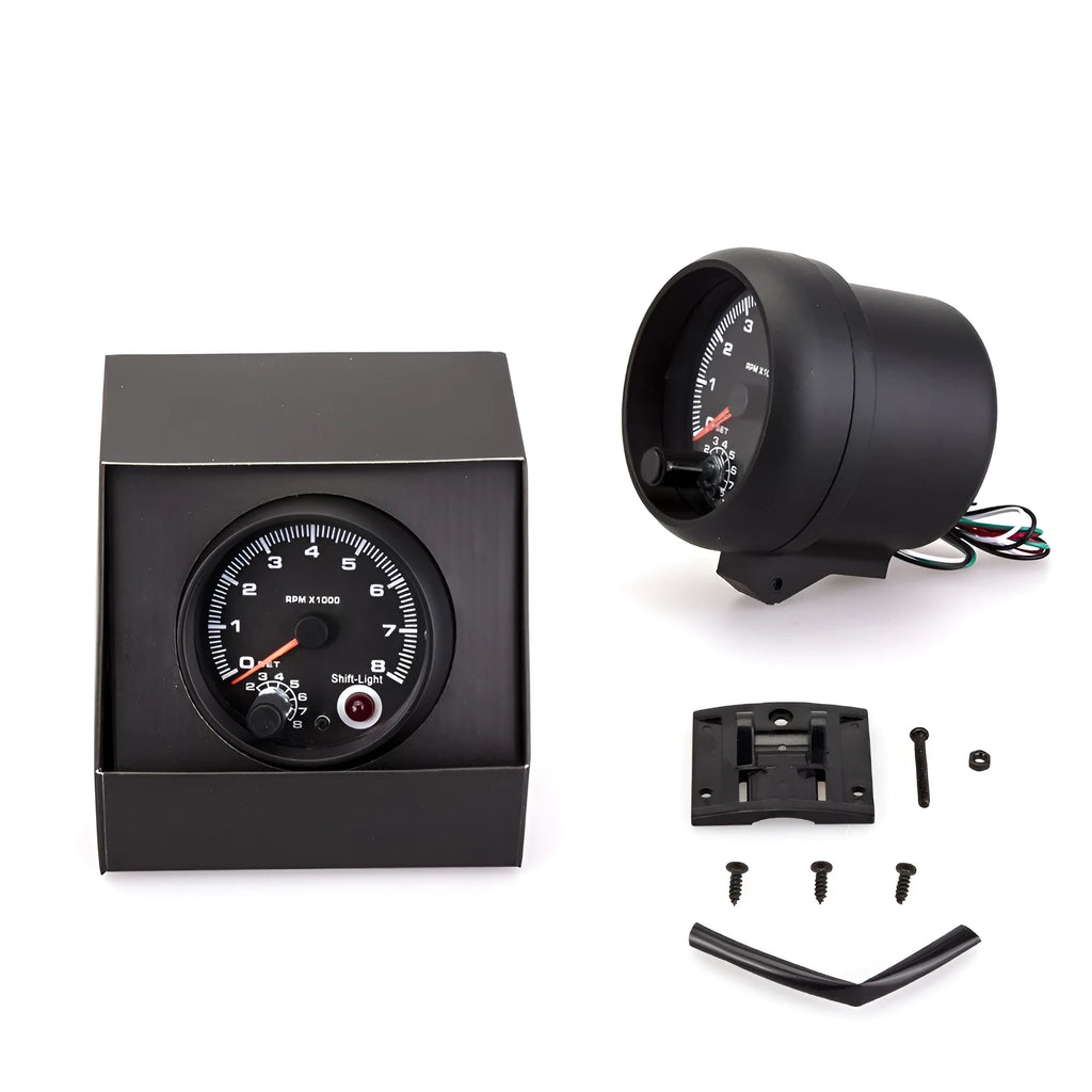 Black automotive tachometer with blue light pointer display for engine RPM measurement