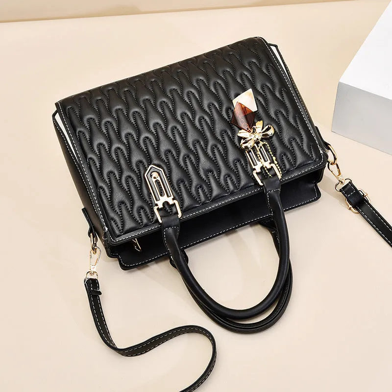 Women's large simple shoulder messenger bag in polyester available in five colours.
