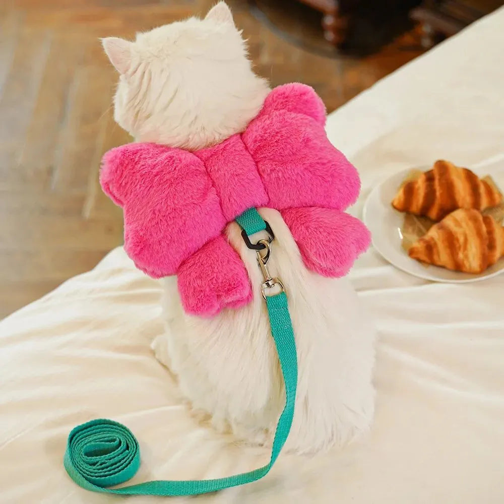 Pet bow chest strap traction rope in pink, size M, on a small dog with cute bow on back