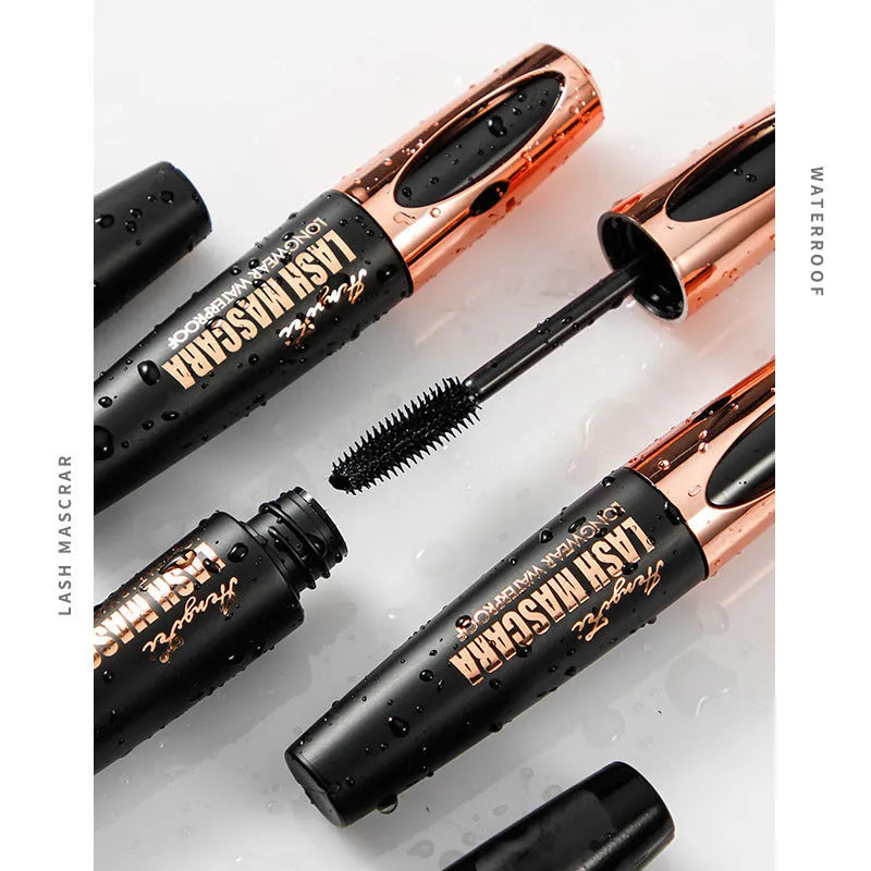 Black waterproof mascara tube creating thick, long curled lashes with sweat and smudge resistance