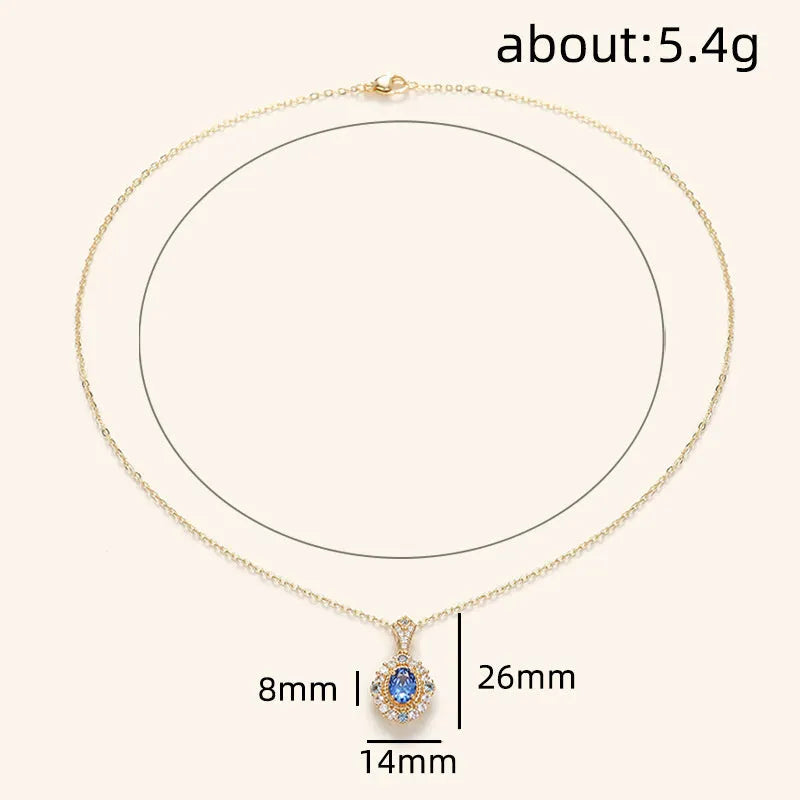 Adjustable yellow gold colour copper necklace with a detailed inlaid zircon and mixed gem pendant.