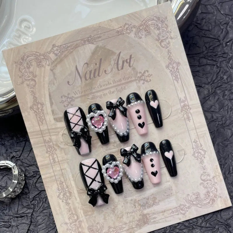 Hand-painted black pink heart and bow pattern cat's eye artificial nails in four sizes