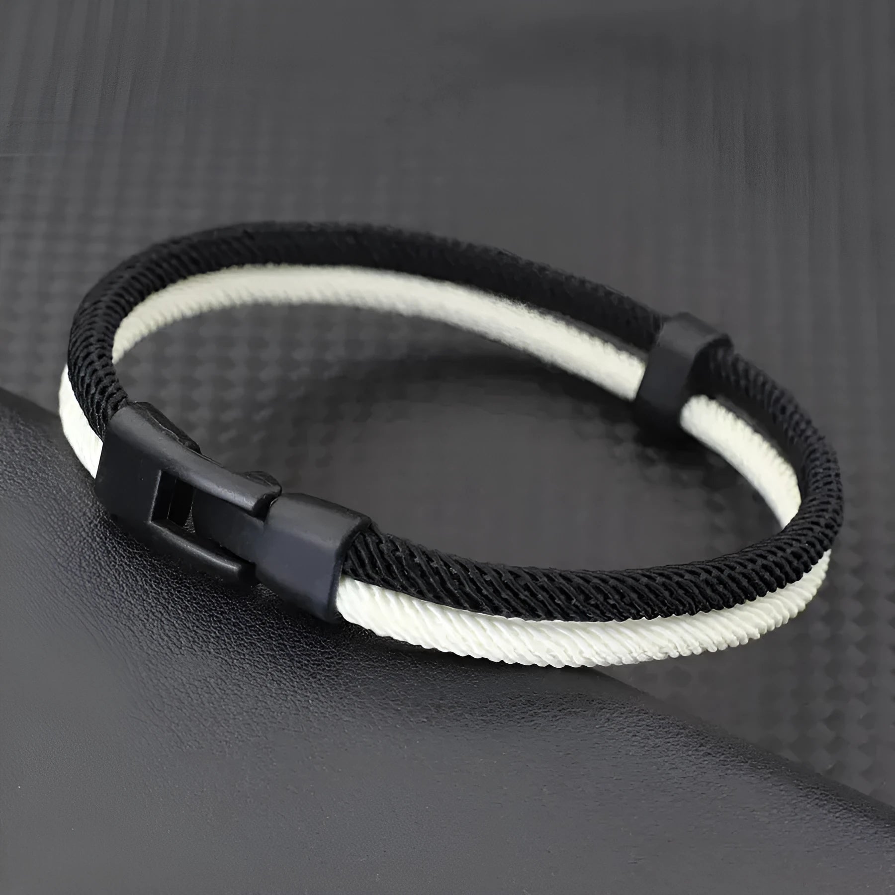 Handmade woven Milan rope alloy hand strap in black or white, showing three size options