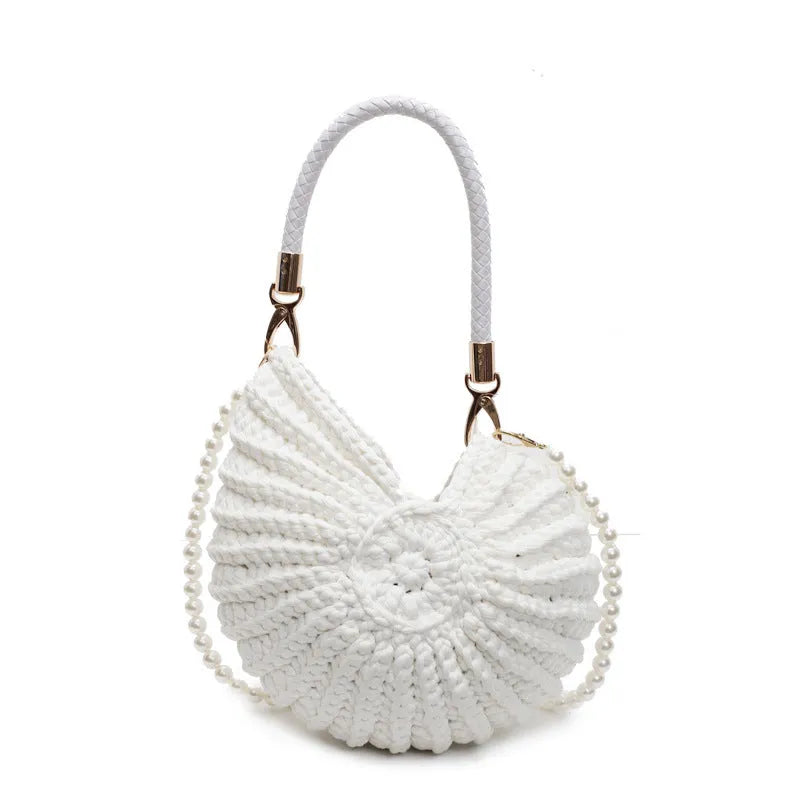 Handmade woven cloth bag in retro style with open pocket and double shoulder straps.