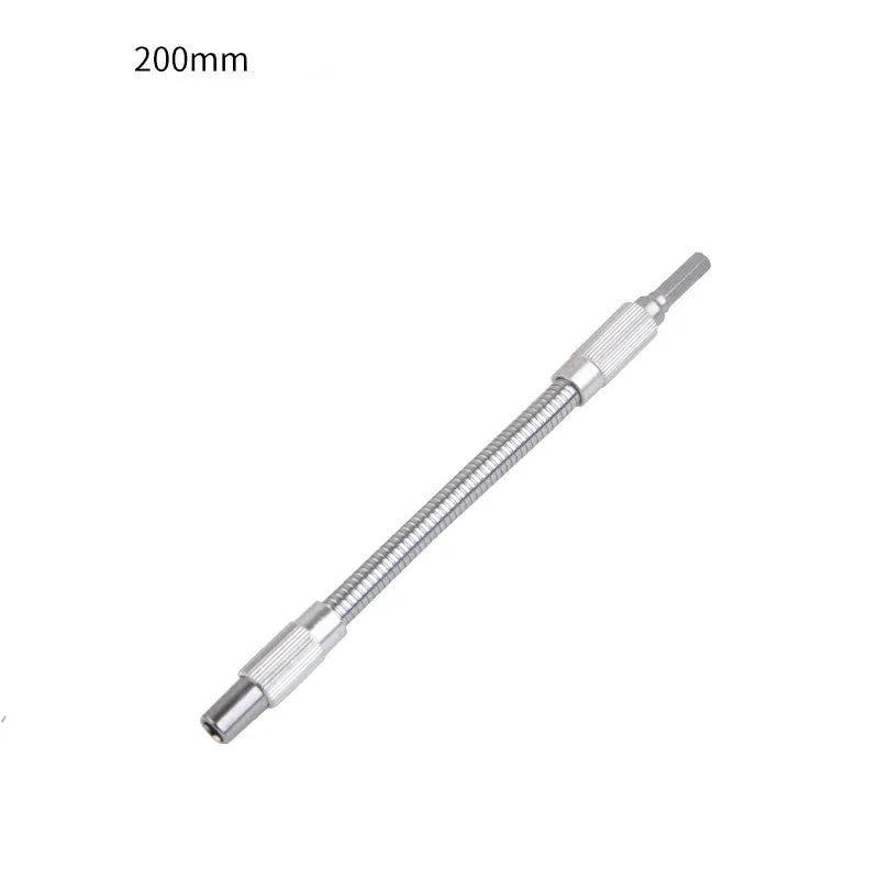 Silver metal flexible shaft extension for cordless drills with 6.35mm shank on a workbench.